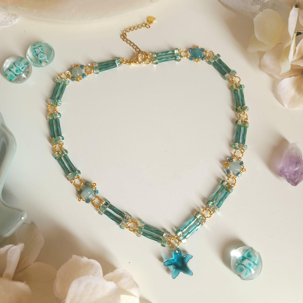 
                  
                    Aqua Star Necklace - By Cocoyu
                  
                