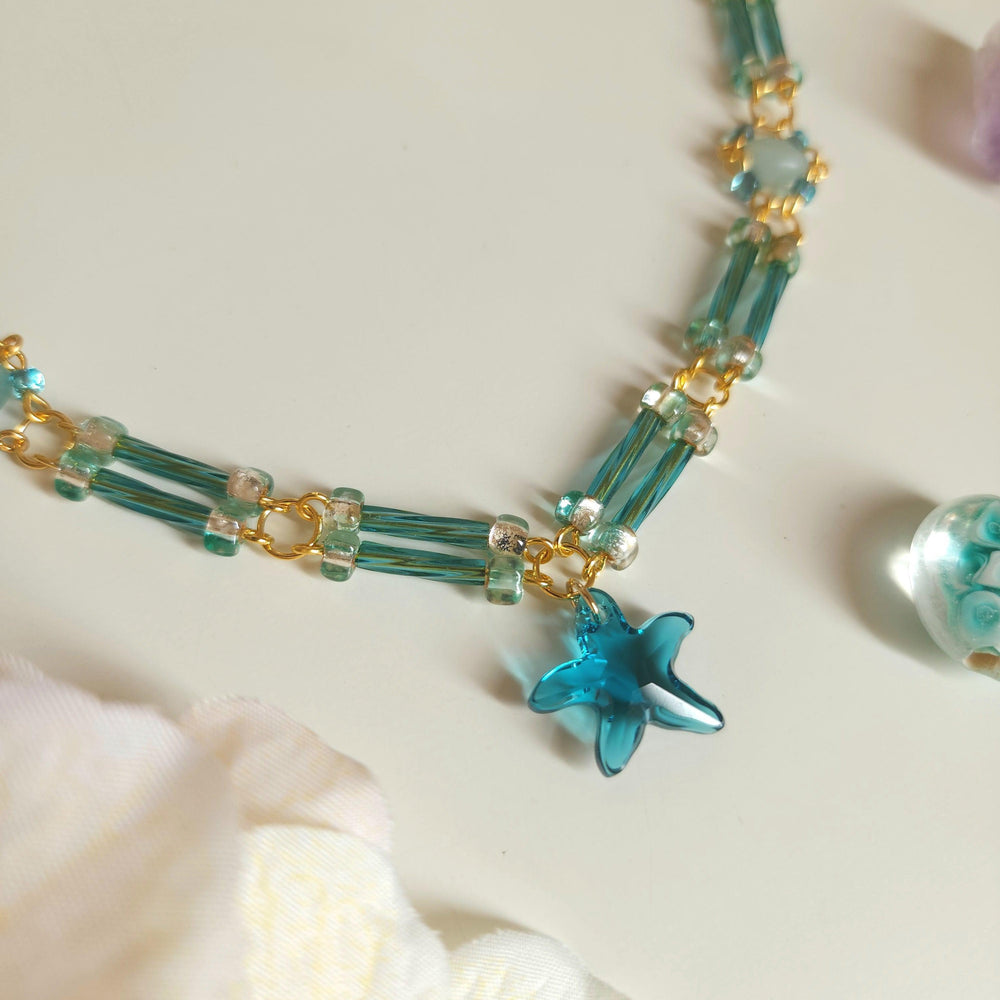 
                  
                    Aqua Star Necklace - By Cocoyu
                  
                