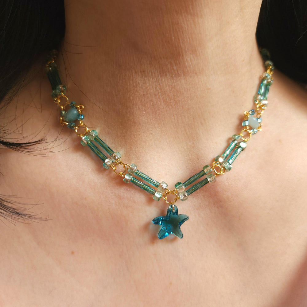 
                  
                    Aqua Star Necklace - By Cocoyu
                  
                